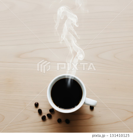 Steaming cup of coffee with beans on table flat ley 131410125