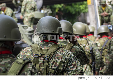 Colombian armed forces with armored units and tanks, Army organizing before combat, Soldiers preparing for military mission 131410288