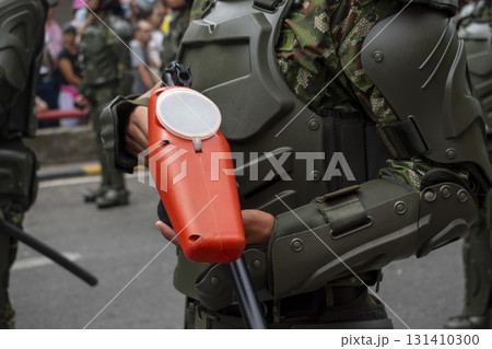 Available force training with paint weapon, Riot police in control practice, Tactical training with paintball markers 131410300