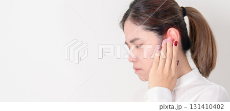 Business Woman having Ear pain for concept of Ear disease, Atresia, Otitis Media, Infection, Pertorated Eardrum, Meniere syndrome, Otolaryngologist, Hearing Loss, Hyperacusis, Tinnitus and Earwax 131410402