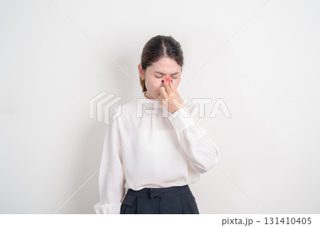 Business Woman having Nose pain for concepts of Nose disease, Common Cold, Influenza, Flu, Covid 19, Respiratory Infection, Sinusitis, Allergic Rhinitis, Asthma, Allergy, Dry nose Anosmia and Health Business Woman having Nose pain for concepts of Nose disease, Common Cold, Influenza, Flu, Covid 19, Respiratory Infection, Sinusitis, Allergic Rhinitis, Asthma, Allergy, Dry nose Anosmia and Health 131410405