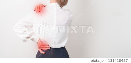 Business woman having back body ache for concepts of Back Muscle Strain, Piriformis Syndrome, Low Back Pain, Lumbar Disc Degeneration, Herniated, Osteoporosis, Spinal Compression and Office syndrome 131410427