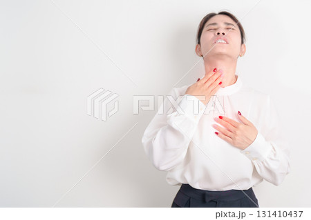 Gastroesophageal Reflux Disease or GERD, Acid reflux disease, Gastro Oesophageal or GORD and Dyspepsia concept. Business woman having Stomach ache and Esophageal pain due to Digestion system problem 131410437