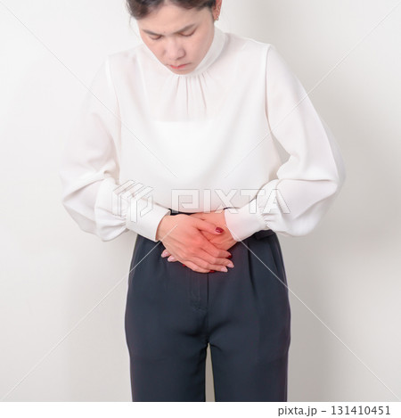 Business woman having Colon pain for Colonic disease, Inflammatory Bowel, IBD, Colorectal cancer, Ulcerative colitis, Diverticulitis, Irritable bowel syndrome, Digestive system and Health concept Business woman having Colon pain for Colonic disease, Inflammatory Bowel, IBD, Colorectal cancer, Ulcerative colitis, Diverticulitis, Irritable bowel syndrome, Digestive system and Health concept 131410451