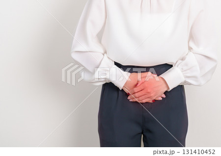 Business woman having Bladder pain for concepts of Bladder disease, Cancer Awareness Month May, Cystitis, Bladder Stone, urinary tract infection, UTI, Urethritis, Pyelonephritis, Urinary incontinence 131410452