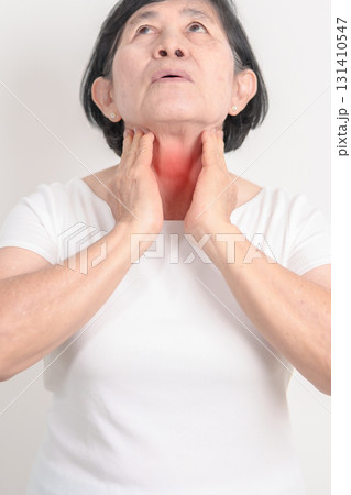 elderly Woman checking Thyroid gland disease. Hand holding Neck pain and Sore Throat. Hyperthyroidism, Hypothyroidism, Hashimoto Thyroiditis, Thyroid Tumor and Cancer, Postpartum, Papillary Carcinoma elderly Woman checking Thyroid gland disease. Hand holding Neck pain and Sore Throat. Hyperthyroidism, Hypothyroidism, Hashimoto Thyroiditis, Thyroid Tumor and Cancer, Postpartum, Papillary Carcinoma 131410547