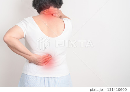 Elderly woman having back body ache for concepts of Back Muscle Strain, Piriformis Syndrome, Low Back Pain, Lumbar Disc Degeneration, Herniated, Osteoporosis, Spinal Compression and Health care Elderly woman having back body ache for concepts of Back Muscle Strain, Piriformis Syndrome, Low Back Pain, Lumbar Disc Degeneration, Herniated, Osteoporosis, Spinal Compression and Health care 131410600