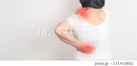Elderly woman having back body ache for concepts of Back Muscle Strain, Piriformis Syndrome, Low Back Pain, Lumbar Disc Degeneration, Herniated, Osteoporosis, Spinal Compression and Health care Elderly woman having back body ache for concepts of Back Muscle Strain, Piriformis Syndrome, Low Back Pain, Lumbar Disc Degeneration, Herniated, Osteoporosis, Spinal Compression and Health care 131410602