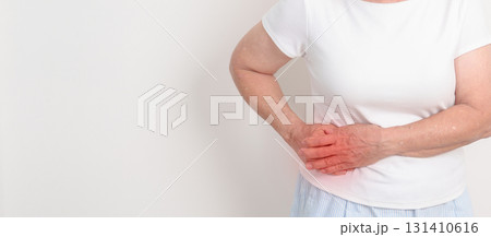 Elderly woman having side and Back Waist pain for Kidney disease, Urinary system and Stones, world Kidney and Cancer day, Chronic kidney, Organ Donor Day and Health care concept 131410616