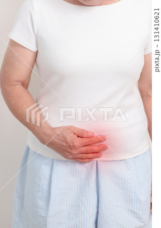 Elderly woman having Bladder pain for concepts of Bladder disease, Cancer Awareness Month May, Cystitis, Bladder Stone, urinary tract infection, UTI, Urethritis, Pyelonephritis, Urinary incontinence 131410621