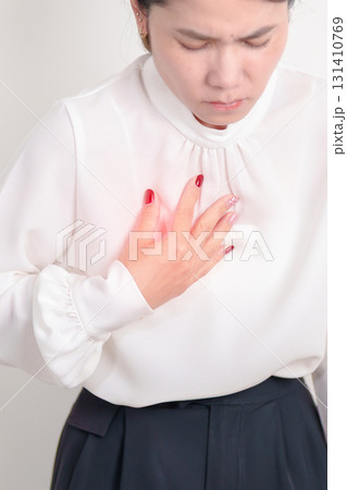 Woman having Chest pain for concepts of Lung Disease, Lung Cancer, Asthma, Chronic Obstructive Pulmonary or COPD, Bronchitis, Emphysema, Cystic Fibrosis, Bronchiectasis, Pneumonia and world Lung day 131410769