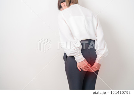 Business Woman having Anal symptoms pain for Hemorrhoids disease, Constipation, Anal cancer awareness month, diarrhea, Irritable Bowel Syndrome, IBS, Inflammation, Colorectal cancer and Anal Procttis Business Woman having Anal symptoms pain for Hemorrhoids disease, Constipation, Anal cancer awareness month, diarrhea, Irritable Bowel Syndrome, IBS, Inflammation, Colorectal cancer and Anal Procttis 131410792