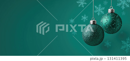 Two green Christmas ornaments with snowflakes 131411395