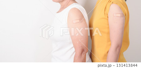 Adult and Elderly Woman with bandage after received vaccine. Vaccination and Immunization for Influenza, HPV, Zoster, IPD, DTP, Dengue, Encephalitis, Rabies, Pneumococcal Hepatitis B and Covid vaccine Adult and Elderly Woman with bandage after received vaccine. Vaccination and Immunization for Influenza, HPV, Zoster, IPD, DTP, Dengue, Encephalitis, Rabies, Pneumococcal Hepatitis B and Covid vaccine 131413844