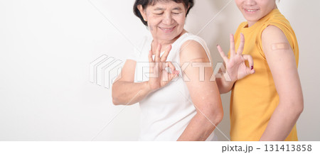 Adult and Elderly Woman with bandage after received vaccine. Vaccination and Immunization for Influenza, HPV, Zoster, IPD, DTP, Dengue, Encephalitis, Rabies, Pneumococcal Hepatitis B and Covid vaccine Adult and Elderly Woman with bandage after received vaccine. Vaccination and Immunization for Influenza, HPV, Zoster, IPD, DTP, Dengue, Encephalitis, Rabies, Pneumococcal Hepatitis B and Covid vaccine 131413858