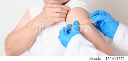 Elderly Woman with bandage after received vaccine. Vaccination and Immunization for Influenza, Herpes Zoster, Tetanus, Covid 19 booster, Dengue, Encephalitis, Rabies, Pneumococcal, IPD, RSV Vaccines Elderly Woman with bandage after received vaccine. Vaccination and Immunization for Influenza, Herpes Zoster, Tetanus, Covid 19 booster, Dengue, Encephalitis, Rabies, Pneumococcal, IPD, RSV Vaccines 131413871