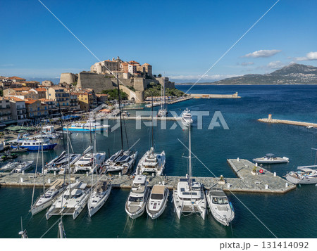 Aerial view Citadel of Calvi Upper Corsica French maritime stronghold in the Mediterranean Sea with defensive walls Aerial view Citadel of Calvi Upper Corsica French maritime stronghold in the Mediterranean Sea with defensive walls 131414092