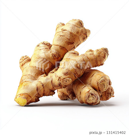 緑の葉を添えたフレッシュな生姜のクローズアップ 131415402