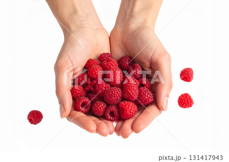 raspberries in hands 131417943