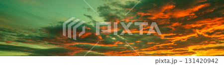 Colorful dramatic cloudy sky at sunset. Gradient color. Sky texture, abstract nature background. Horizontal banner 131420942