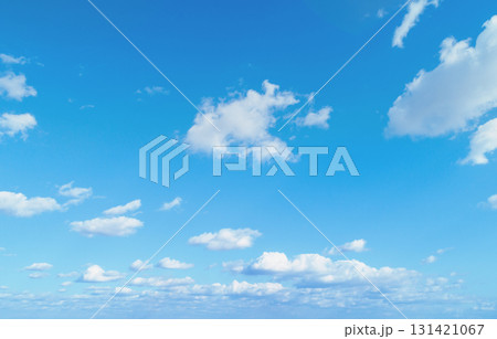 Blue cloudy sky on a sunny day.  Sky texture. Abstract nature background 131421067