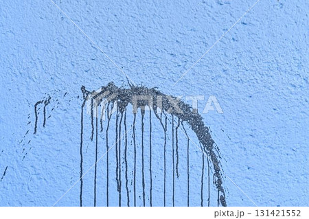 The coarse texture of a dark blue wall with a bold stain. The rough texture of a deep blue wall with an ink blot. The concept of background and textured surface. The coarse texture of a dark blue wall with a bold stain. The rough texture of a deep blue wall with an ink blot. The concept of background and textured surface. 131421552