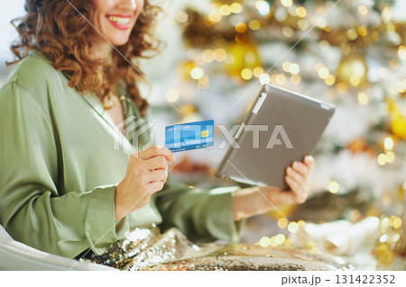 Happy Woman with Tablet for Seasonal Shopping 131422352