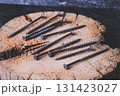 Fasteners for wood. Self-tapping screws on a wooden table. 131423027
