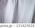 Texture of white fabric. White background close up. Factory fabric in white. 131423028