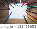 Colored pencils and white paper. Children's creativity. Template for drawing. 131423053