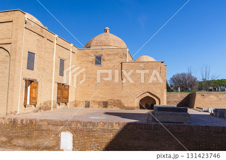 Street photography featuring ancient buildings with arches. Samarkand Street photography featuring ancient buildings with arches. Samarkand 131423746