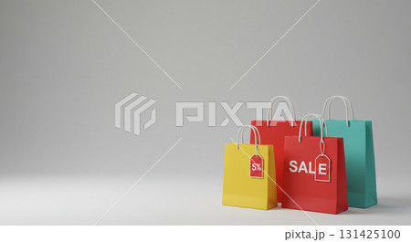 セールタグ付きのカラフルなショッピングバッグとグレー背景 131425100