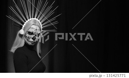 Creative Santa Muerte style portrait with purple Sugar Skull Makeup, tiara, and floral headdress. Fantasy art, mysterious glamour, gothic allure, surreal inspiration, divine feminine expression Creative Santa Muerte style portrait with purple Sugar Skull Makeup, tiara, and floral headdress. Fantasy art, mysterious glamour, gothic allure, surreal inspiration, divine feminine expression 131425771