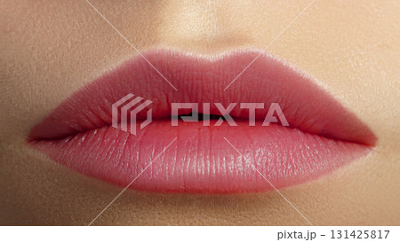 Close up of beautiful woman lips with plum matt tint. Daily make-up with lipstick. Cosmetology or fashion makeup concept. Macro beauty studio shot. Passionate kiss on Valentines day 131425817