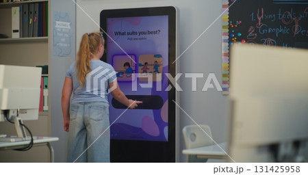 Young Schoolgirl on AI Mood Tracker Takes Test to Determine Personality Type Young Schoolgirl on AI Mood Tracker Takes Test to Determine Personality Type 131425958