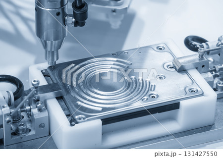 The hard disk assembly process by automatic screw driver in the blue tone scene. 131427550