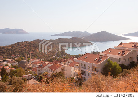 Beautiful coastal town with small white houses taken from above. Houses by the sea. Beautiful coastal town with small white houses taken from above. Houses by the sea. 131427805