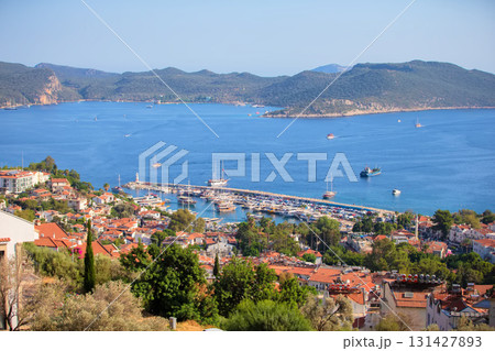 Beautiful coastal town with small white houses taken from above. Houses by the sea. 131427893