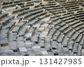 Part of an ancient amphitheater with a stone staircase. 131427985