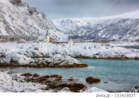 Amazing snowy winter scene of  Valberg village with snowy  mountain peaks on Lofoten Islands 131428037