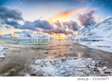 Amazing winter scenery with Haukland beach during sunset and snowy  mountain peaks near Leknes. 131428077