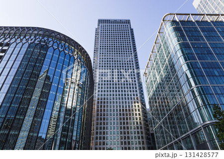 Glass Skyscrapers in Financial District. Modern Corporate Architecture and Blue Sky Glass Skyscrapers in Financial District. Modern Corporate Architecture and Blue Sky 131428577