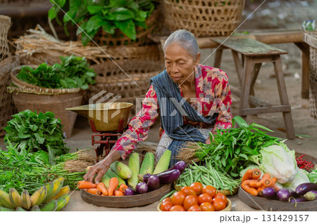 Visit a lively local market vendor for a variety of fresh vegetables and fruits to enjoy Visit a lively local market vendor for a variety of fresh vegetables and fruits to enjoy 131429157