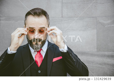Businessman bearded Latin stylish handsome wearing sunglasses with space for text 131429639