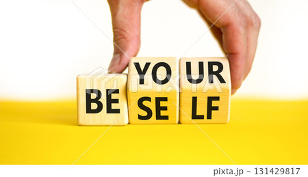 Motivational be yourself symbol. Concept words Be yourself on beautiful wooden block. Beautiful white background Businessman hand. Business motivational be yourself concept. Copy space. 131429817