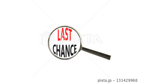 Last chance symbol. Concept word Last chance on beautiful magnifying glass. Beautiful white paper background. Black magnifying glass. Business last chance concept. Copy space. Last chance symbol. Concept word Last chance on beautiful magnifying glass. Beautiful white paper background. Black magnifying glass. Business last chance concept. Copy space. 131429968