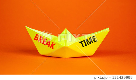 Break time symbol. Concept word Break time on beautiful yellow paper boat. Beautiful orange paper background. Business break time concept. Copy space. 131429999