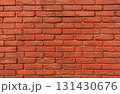 Close-up view of red brick wall featuring various textures and color tones, craftsmanship and strength of traditional masonry work, background with copy space 131430676