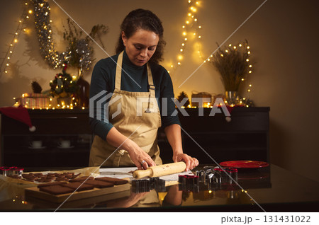 Woman Baking Christmas Cookies At Cozy Home During Holiday Decorations Woman Baking Christmas Cookies At Cozy Home During Holiday Decorations 131431022