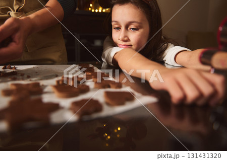 Family Christmas Baking Moment With Kids Making Gingerbread Cookies At Home 131431320
